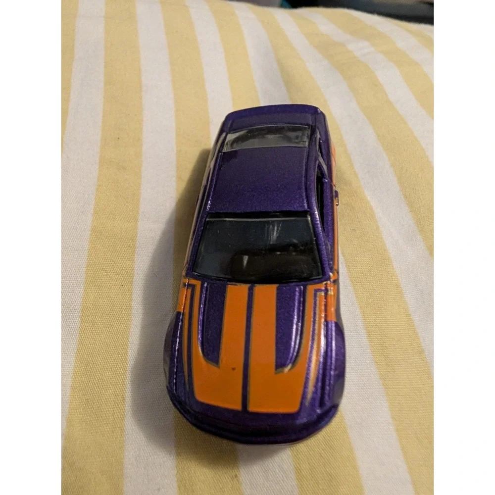 2010 Hot Wheels Ford Mustang GT Purple Diecast Toy Car 1:64 Scale